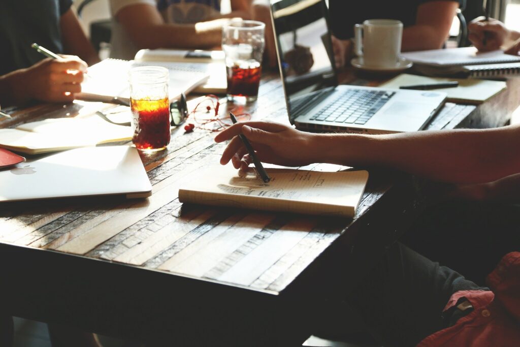 Laptop, notebook and smartphone on a desk