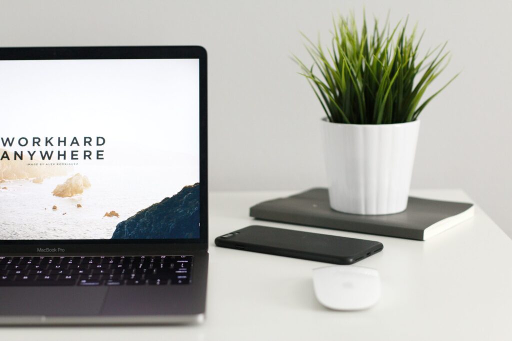Laptop on a tidy desk, ready to work from anywhere