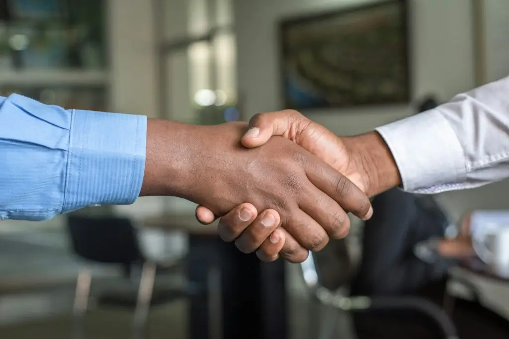 Handshake agreeing a move to a new IT provider