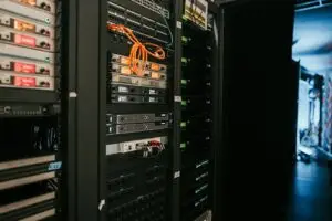 Rack of servers in a server room, representing secure business backup infrastructure